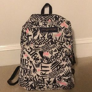 Cute pink, black, and white jansport book bag